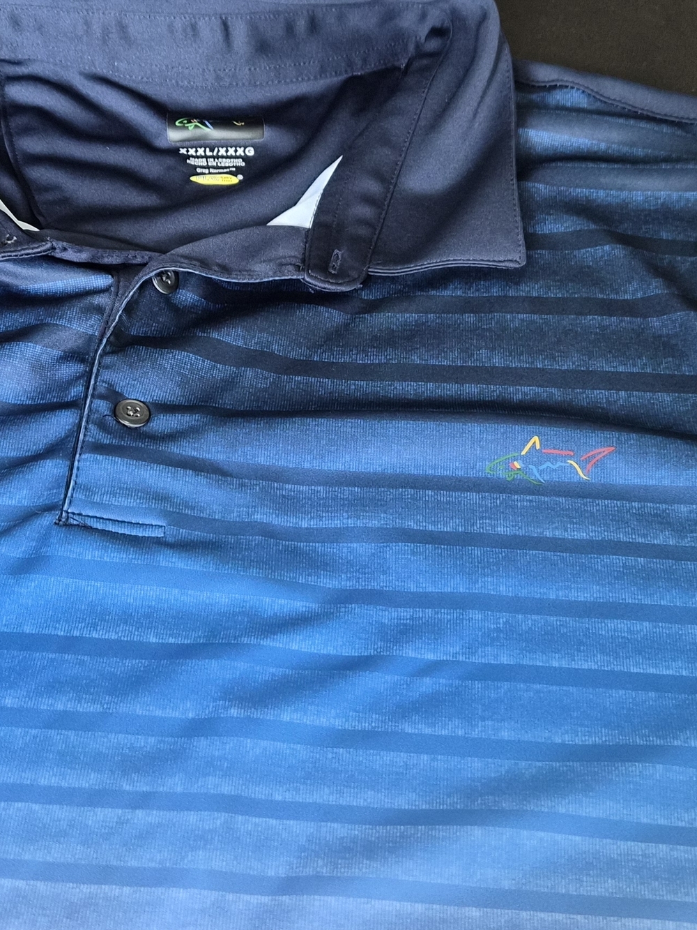 Greg Norman Collection Blue Ombre Striped Polo with Multicolor Shark Logo